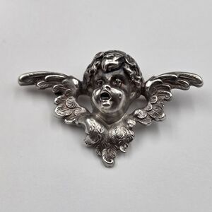 Antique Art Nouveau Sterling Silver Repousse Winged Cherub Brooch